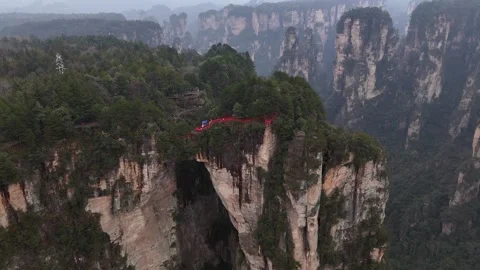Aerial View of the first bridge under heaven in Zhangjiajie National Forest Park Vídeos de archivo 344163275