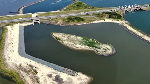 Aerial view of the Fish Migration River at the Afsluitdijk in the Netherlands Stock Footage 337515500