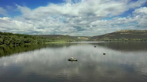 Aerial view of fisherman at the boat on river. Fisherman life style Видео