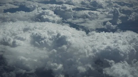 Aerial view of flight above clouds in sunny day Video stock 97079714
