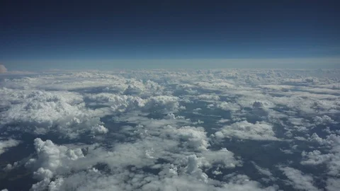 Aerial view of flight above clouds in sunny day Stock Footage 97079758