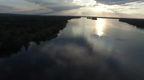 Aerial view, flight backward. Big river during sunset Video stock 63399649