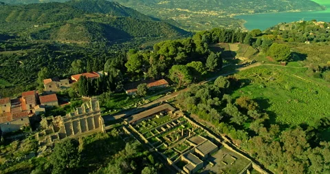 Aerial view, flight backwards, of the archaeological area of Tindari Stock Footage 233429868