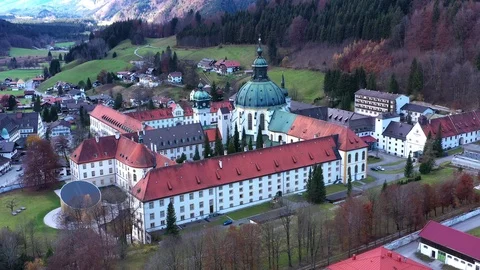 Aerial view, Flight at Benedictine abbey Ettal monastery, Ettal, Oberammergau Stock Footage 99697489