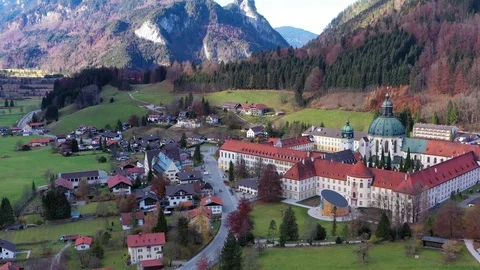 Aerial view, Flight at Benedictine abbey Ettal monastery, Ettal, Oberammergau Stock Footage 99697494
