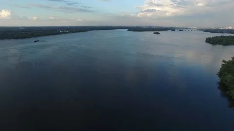 Aerial view, flight down. Big river during sunset Stock Footage 63399789