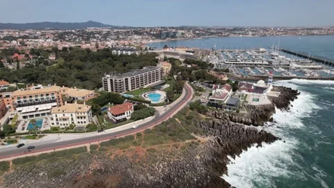Aerial view flight drone coast waves Cascais Portugal. Coastal town beautiful Stock Footage 237120646