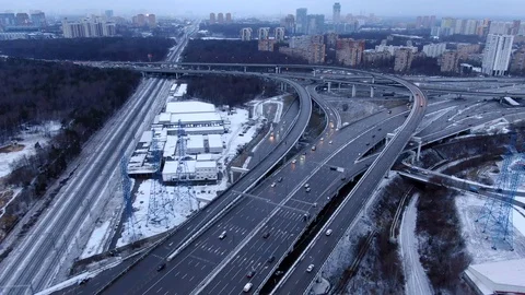 Aerial view flight of drone over clouds with tracking of moving cars Video stock 122080026