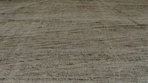 Aerial view flight of drone over snowy beveled field at low altitude Video stock 122430067