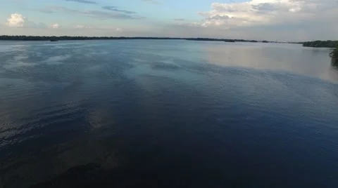 Aerial view, flight forward. Big river during sunset. 스톡 동영상 63399604