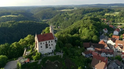 Aerial view, flight at Gweinstein with castle and pilgrimage church to the Ho Stock Footage 181445992