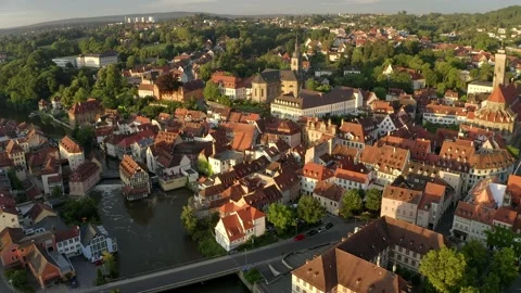 Aerial view, flight at old town with Bamberg Cathedral on the Regnitz, Bamber Stock Footage