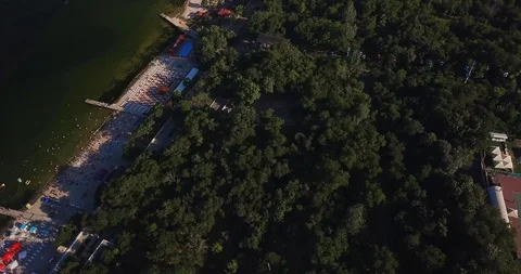 Aerial view flight over the beach summer day vacation people bathing Stock Footage 128069403