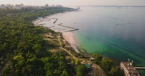 Aerial view flight over the beach with city view Stock Footage 128070336