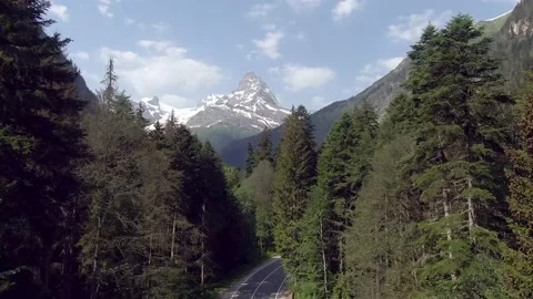 Aerial view flight over a beautiful mountain road. Video stock 156346906