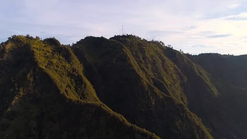 Aerial view flight over Cemoro Lawang Stock Footage 75329420