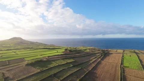 Aerial view flight over fields land  and atlantic ocean Island Azores Stock Footage 221560245