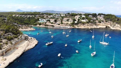 Aerial view, flight over the Five Fingers Bay of Portals Vells, Mallorca, Bal Stock Footage 100640929