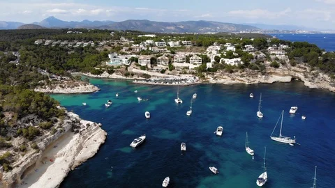 Aerial view, flight over the Five Fingers Bay of Portals Vells, Mallorca, Bal Stock Footage 100641668