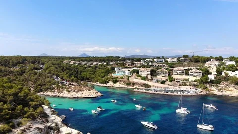 Aerial view, flight over the Five Fingers Bay of Portals Vells, Mallorca, Bal Stock Footage 100641710