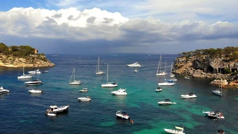 Aerial view, flight over the Five Fingers Bay of Portals Vells, Mallorca, Bal Stock Footage 100642663
