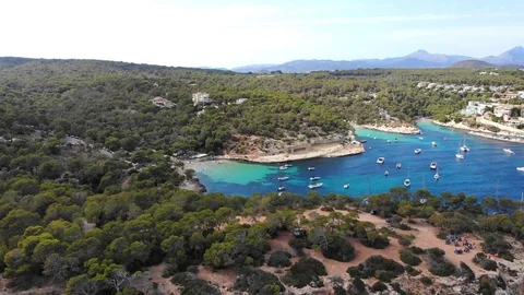 Aerial view, flight over the Five Fingers Bay of Portals Vells, Mallorca, Bal Stock Footage 100642676