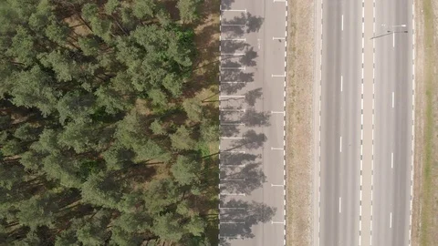 Aerial view. Flight over the forest and road Stock Footage 90747345