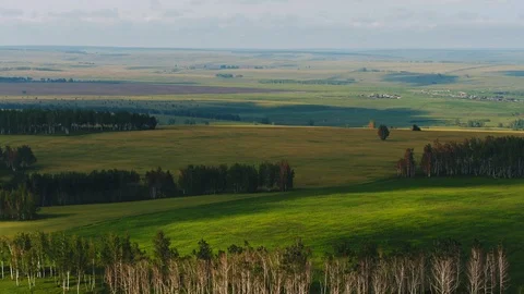 Aerial View. Flight over a green grassy rocky hills. Altai Mountains, Siberia Stock Footage 90056056