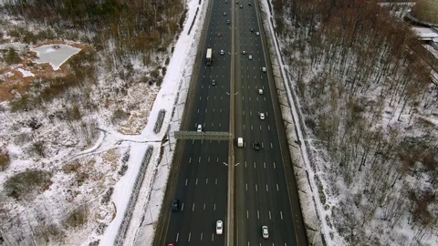 Aerial view flight over high-speed road with moving cars Stock Footage 123602406