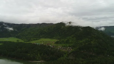 Aerial View. Flight over the Mountain Valley. Morning fog [Altai. Siberia] Stock Footage 91565531