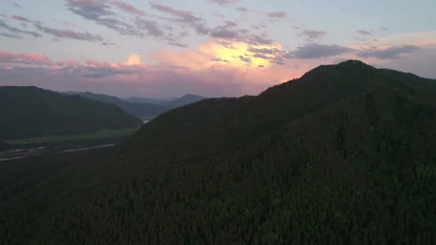 Aerial View. Flight over the Mountain Valley. Evening summer time Altai. Siberia Stock Footage 91686752