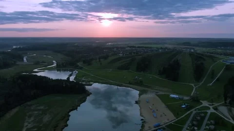 Aerial view flight over a mountain lake with the reflection of clouds Video stock 139143908