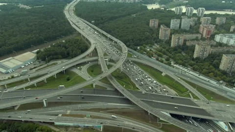 Aerial view flight over a multi-level transport interchange in Moscow at sunset. Stock Footage 138070948