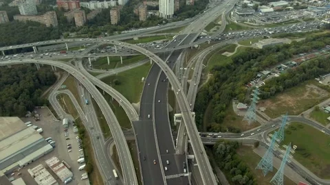 Aerial view flight over a multi-level transport interchange in Moscow at sunset. Video stock 138070987