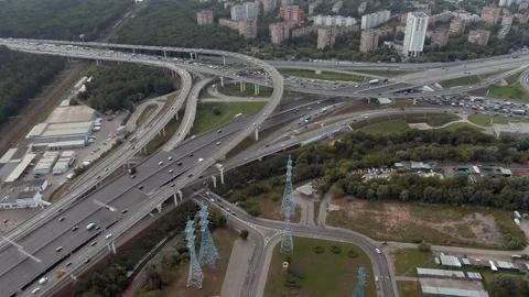 Aerial view flight over a multi-level transport interchange in Moscow at sunset. Stock Footage 138070999