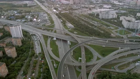 Aerial view flight over a multi-level interchange in the big city. Stock Footage 138890313