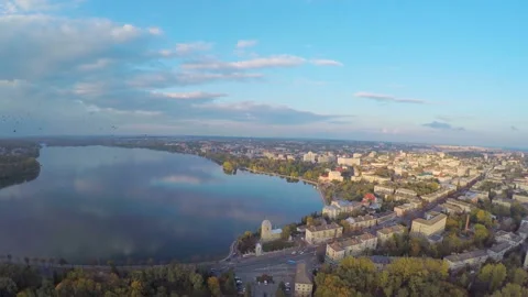 Aerial View flight over the park and beautiful blue lake in the city center Stock Footage 90490700