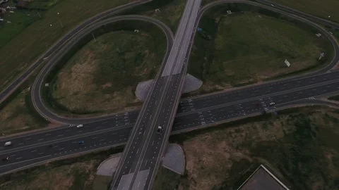 Aerial View. Flight over the road with cars near the forest. Aerial drone shot. Stock-Footage 78572826