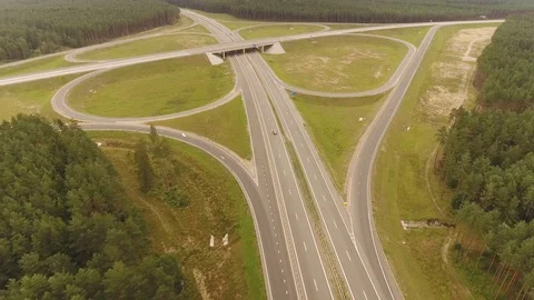 Aerial View. Flight over the road with cars near the forest. Aerial drone shot. Stock-Footage 78589360