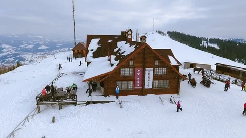 Aerial view flight over ski resort village in winter sunset time valley 스톡 동영상 105267776