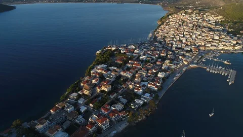 Aerial view. Flight over small beautiful town Ermioni in the sunny morning.  Stock Footage 98185141