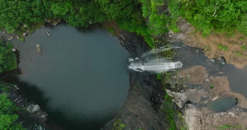 Aerial View. Flight over tropical river stream, forest and mountain in the rainy 스톡 동영상 190617292