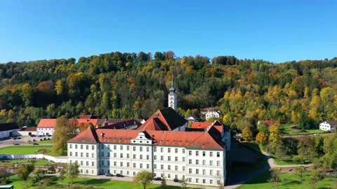 Aerial view, flight at  Schftlarn monastery, Isar valley, Upper Bavaria, Bava Stock Footage 181424156