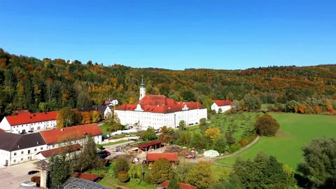 Aerial view, flight at  Schftlarn monastery, Isar valley, Upper Bavaria, Bava Stock Footage 181424336