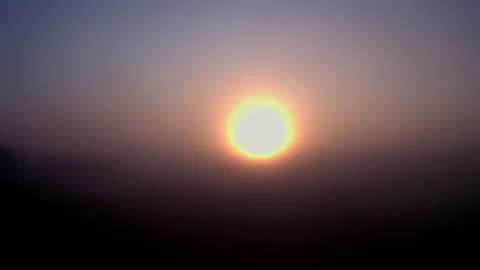 Aerial view of the Flight to the sun through the clouds. On a foggy morning. Stock Footage 123106112
