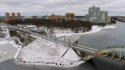 Aerial view flight tracking a moving rail train moving on a bridge Stock Footage 123599691