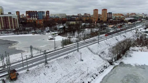 Aerial view flight tracking a moving rail train moving on a bridge Stock Footage 123601682