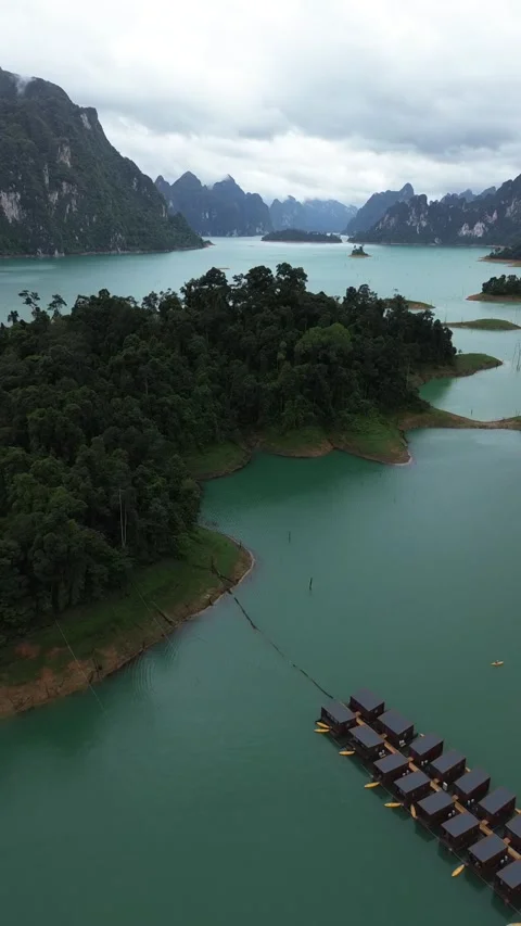 Aerial view of floating bungalows and jungle islands in Thailand Stock Footage 336486553