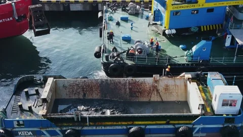 Aerial view floating crane at the pier, workers cleaning the barge Stock Footage 232470144