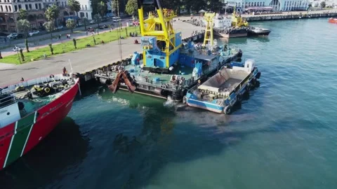 Aerial view floating crane at the pier, workers cleaning the barge Stock Footage 232470251